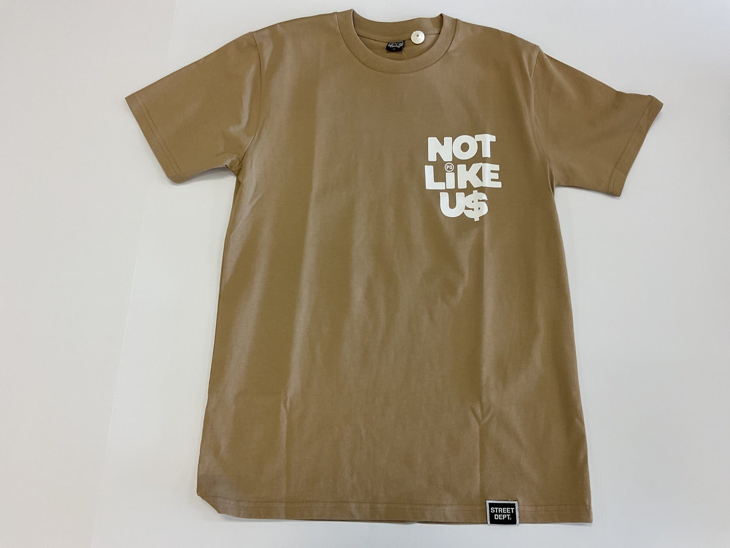 Street Dept- Khaki “Not Like Us” Shirt